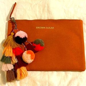 Chic orange clutch with Pom-Pom & tassel bag charm - Cute & Classy! 🧡🧡🧡